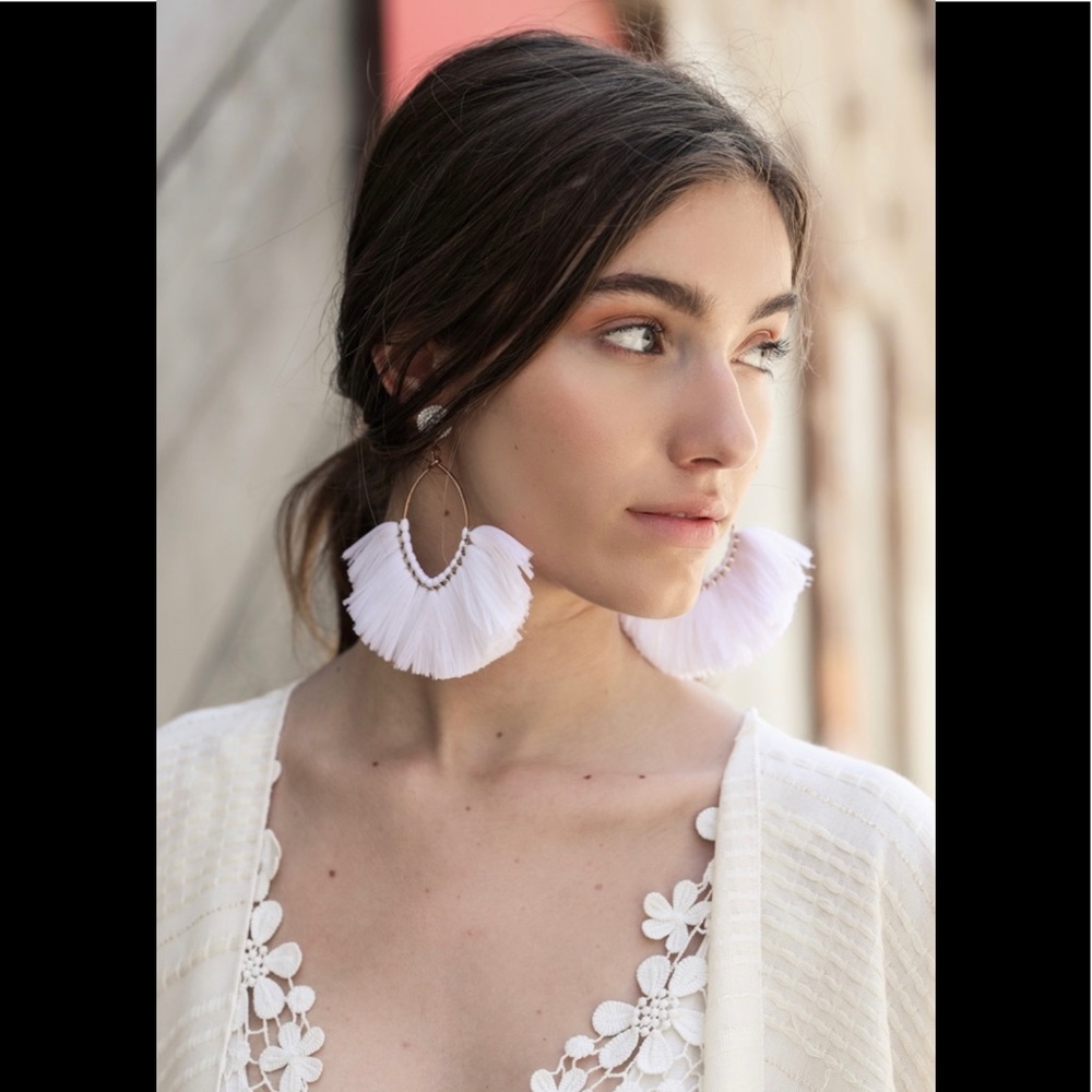White fringe earrings